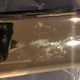 A Secretlab armrest displays signs of wear.
